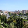 Парк Пуэрто Оскура (Jardines de Puerta Oscura)  со стороны крепости Алькасаба