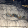 Пещера Каклик с травертинами внутри