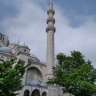 Минарет мечети с тремя балконами

