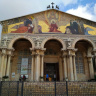 Фасад церкви со статуями евангелистов