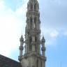 Верхняя часть ажурной башни ратуши. Венчает ее золоченый флюгер со статуей покровителя города Архангела Михаила.