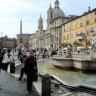 Рим, Пьяцца Навона, справа - фонтан "Нептун", церковь Сант-Аньезе-ин-Агоне. В центре - фонтан "Четырех рек" c обелиском.